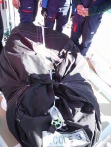 Not a dead body, just an enormous spinnaker in that bag!