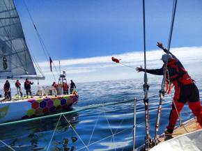Linda throwing to Mission Performance during the transfer drill. First throw hit the boat but guess everyone so caught off guard they didn't grab it. This obviously missed. They would not let me be a Texan, and throw like a lariat. Wonder why???