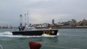 Cool boat on way out of harbor. 