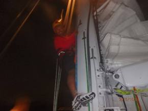 Tony pulling main down at end of race (yes, 1am in the morning)