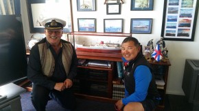 Robert and Han with a model of one of the boats he was Captain 