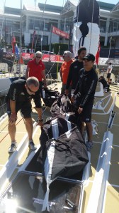 A lot of manpower to move the sail and then slide it into the sail locker.