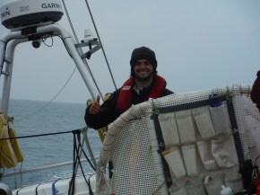 Slowly the wind fills and Alex is happy