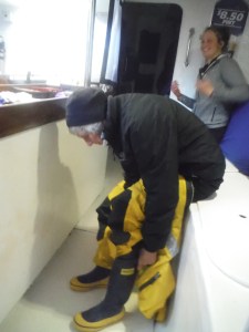 Left foot in and also velcroing pants leg