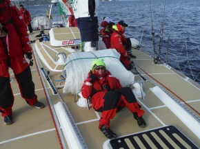 Elaine's turn on the rolled up mainsail