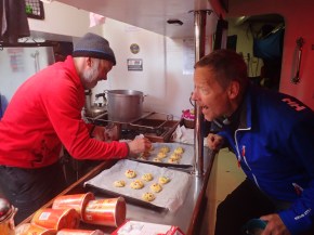 Justin the awesome cookie maker with Doug cheering him on