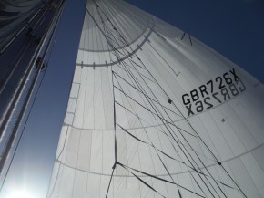 Finished product. The big Band-Aid across top and fixes along the luff.