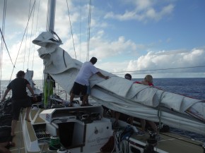 Flaking the main so that the awning could go up and cool shade delivered.