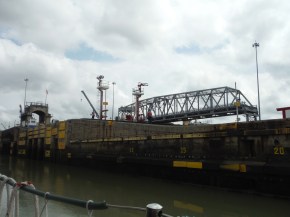 We have a man up on the side that is going to throw a line to us. Actually one for the bow (front) and for the stern (back) of the boat